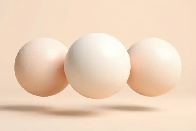 Render 3D conceitual de três esferas com texturas diferentes representando tipos de pele para escolha do hidratante ideal.